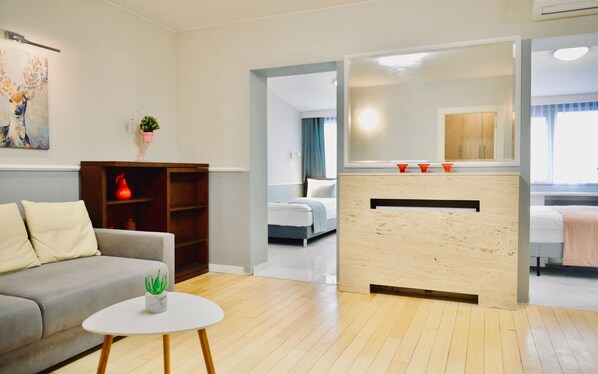 Departamento superior | Área de sala de estar | Televisión de pantalla plana