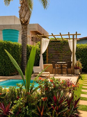 Garden view - Charme e Aconchego - Casa para 10 pessoas com 3 quartos (Capitólio)