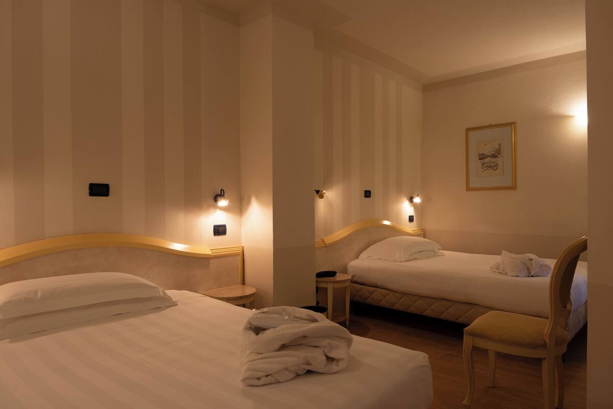 classic twin room | minibar, in-room safe, desk, laptop workspace