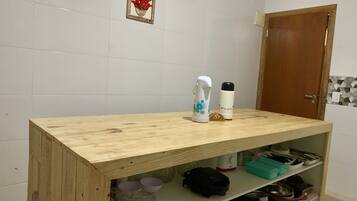 Full-sized fridge, oven, stovetop, cookware/dishes/utensils