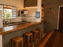 Fridge, microwave, cookware/dishes/utensils
