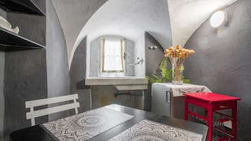 Economy Triple Room, 3 Bedrooms, Partial Sea View | Private kitchen | Full-size fridge, microwave, stovetop, dishwasher