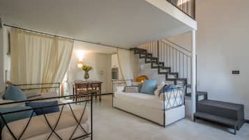 Junior-Suite, Gartenblick | Wohnzimmer | Flachbildfernseher