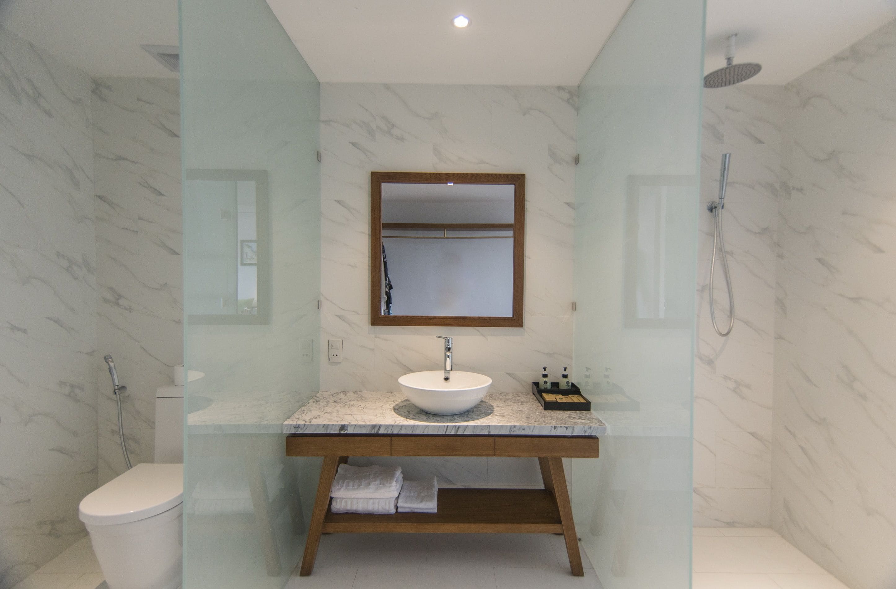 family room | bathroom | shower, rainfall showerhead, free toiletries, hair dryer