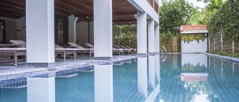 Indoor pool, open 7 AM to 9 PM, pool umbrellas, sun loungers