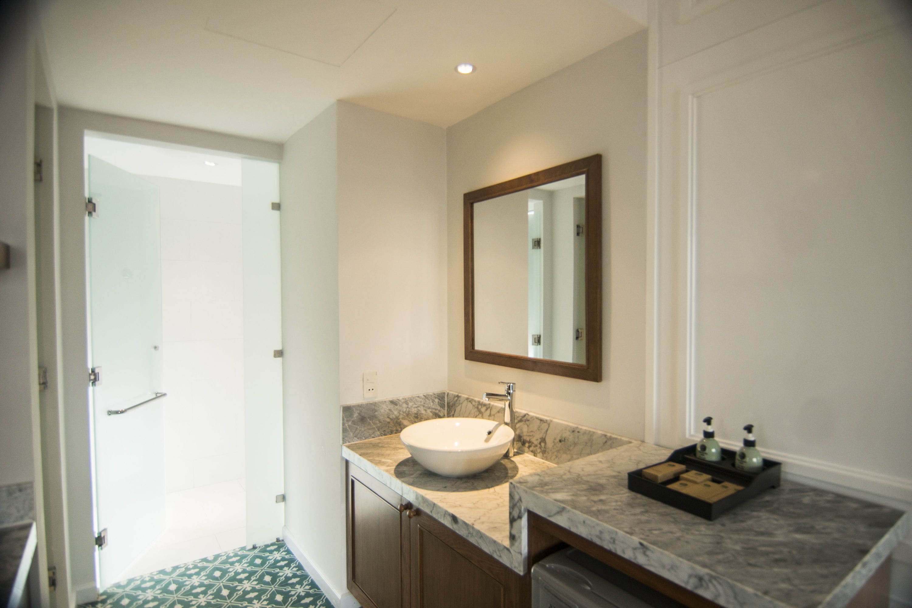 family room | bathroom | shower, rainfall showerhead, free toiletries, hair dryer