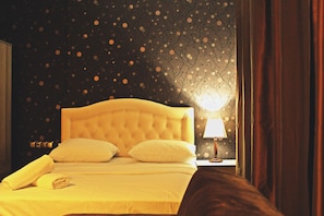 Desk, blackout curtains, soundproofing, bed sheets