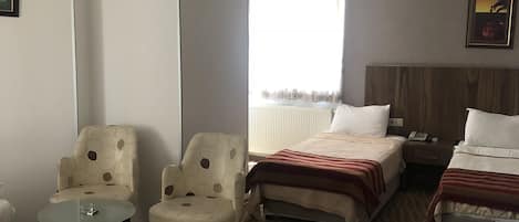 Family Twin Room | Blackout drapes, soundproofing, free WiFi, bed sheets