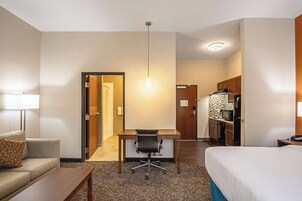 Suíte, 1 cama King, para não fumantes | Roupas de cama premium, cofres nos quartos, escrivaninha