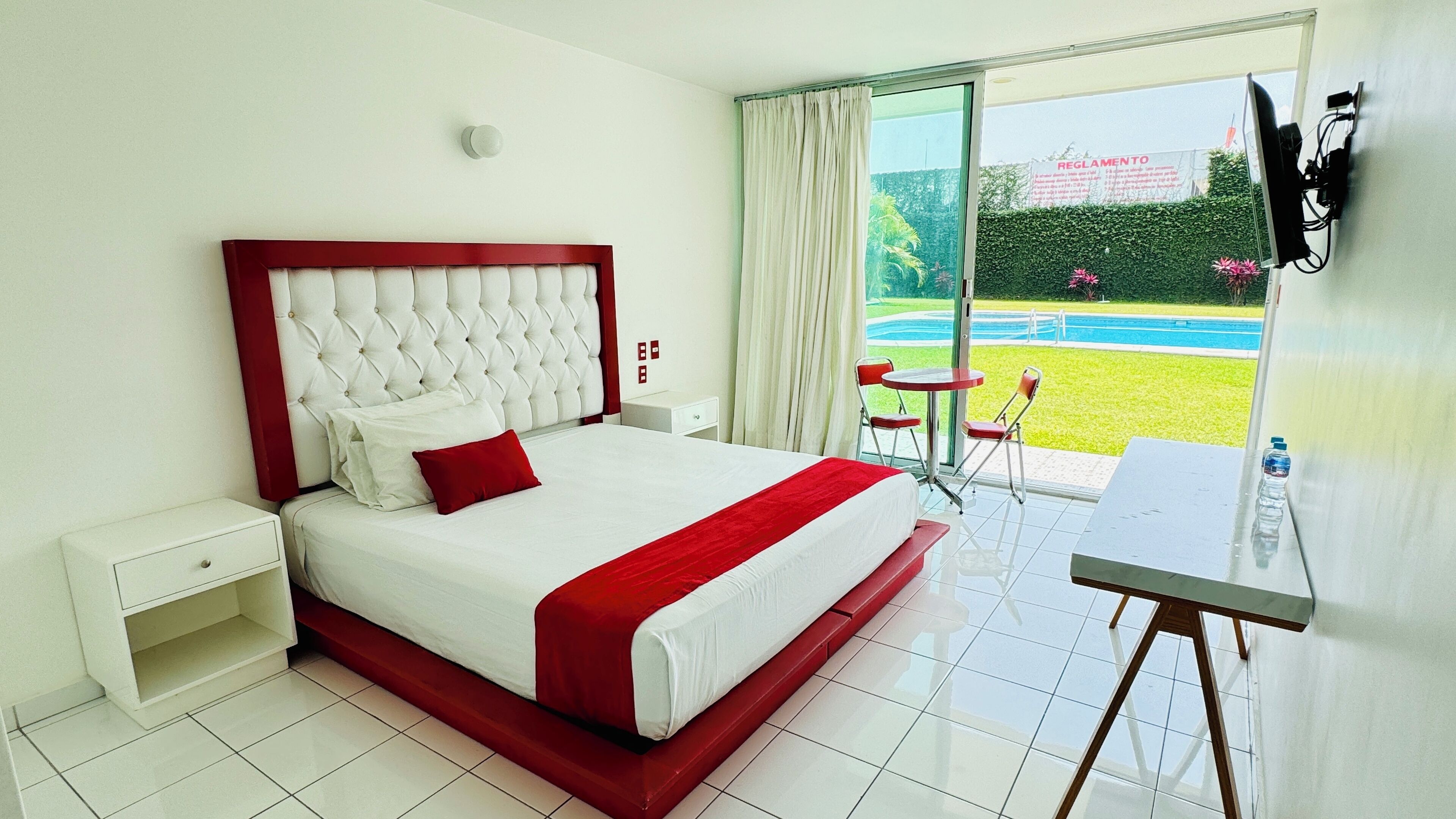 Deluxe Room, 1 King Bed, Air conditioning, Pool View | Egyptian cotton sheets, premium bedding, down comforters