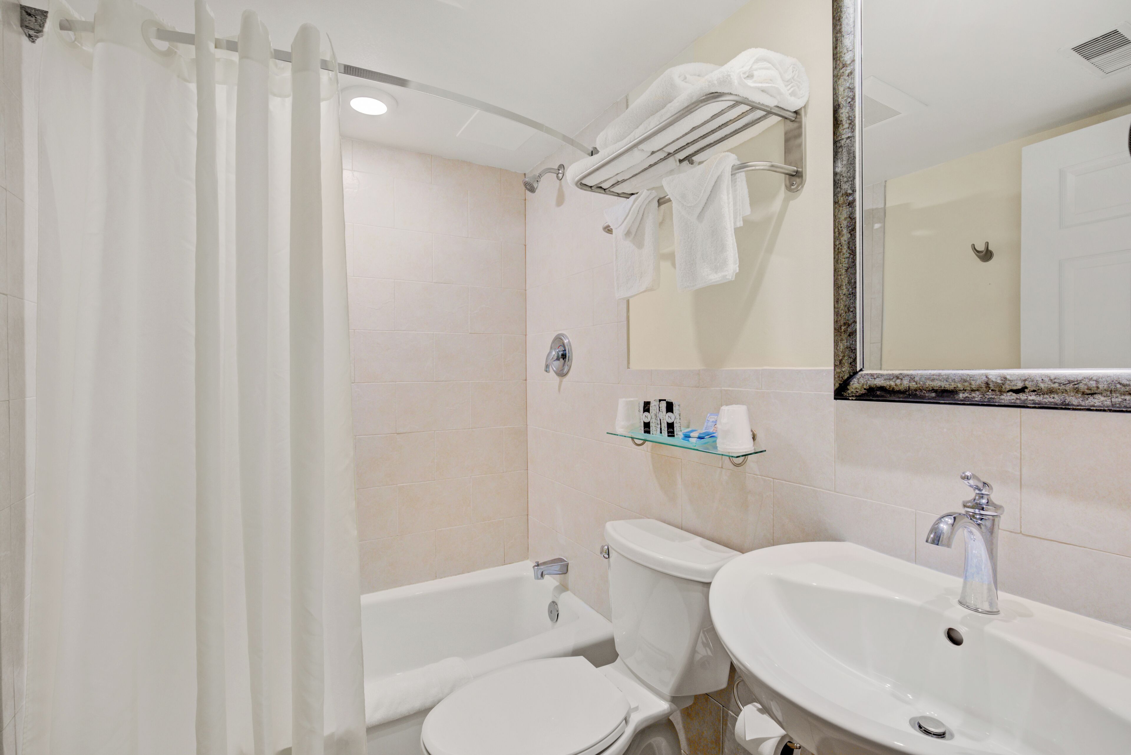 premier suite, multiple beds | bathroom | bathtub, free toiletries, hair dryer, towels