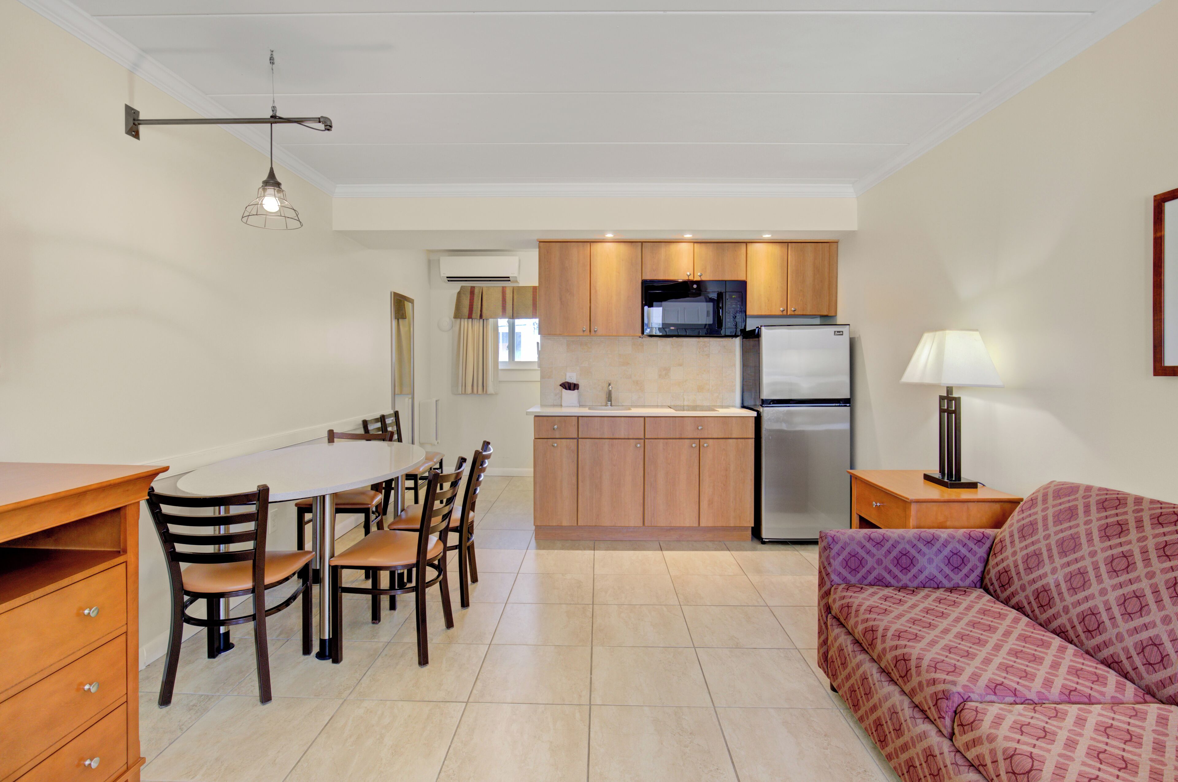 traditional suite, 1 king bed with sofa bed | living area | flat-screen tv