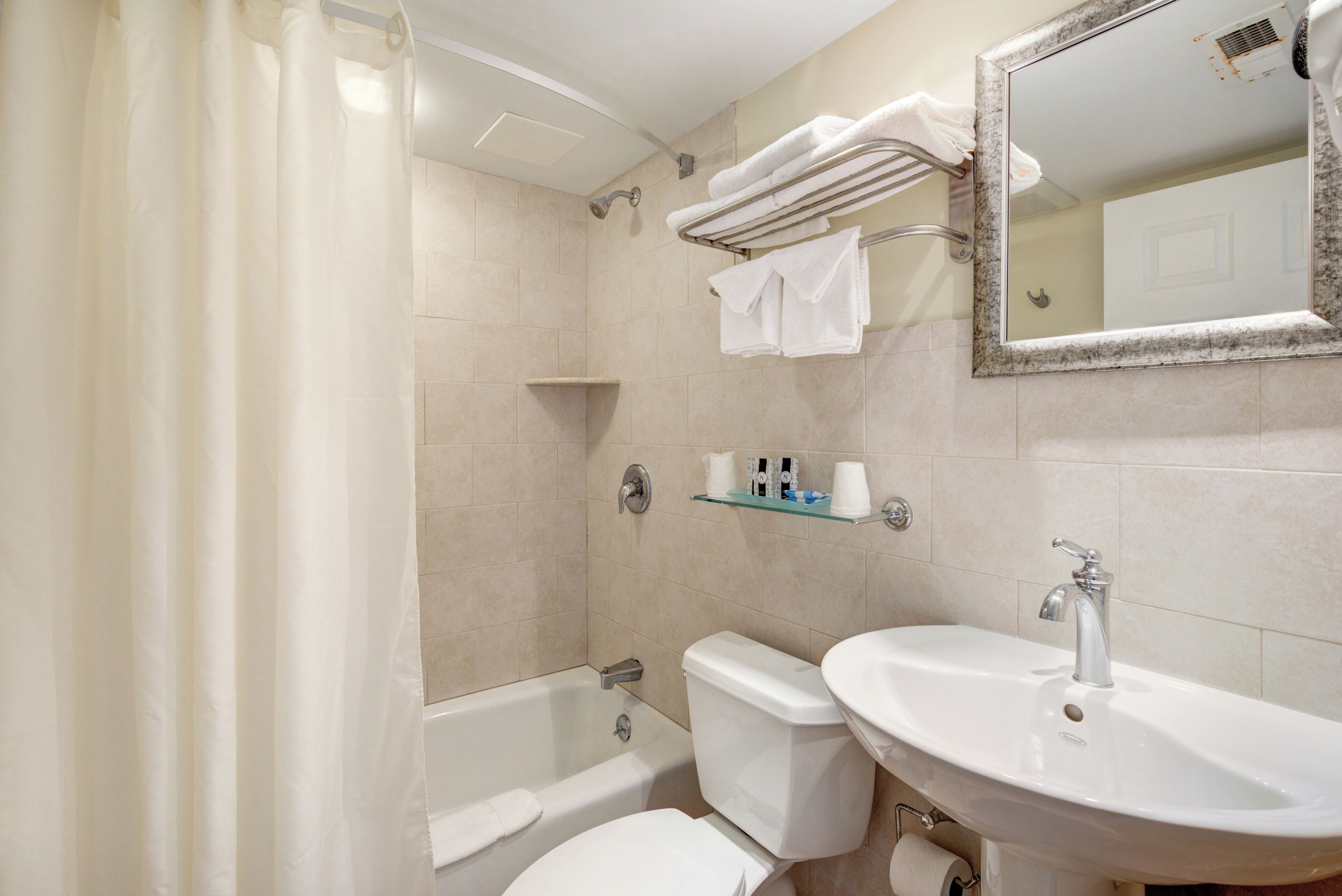 premium suite, multiple beds | bathroom | bathtub, free toiletries, hair dryer, towels