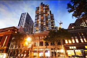 Enjoy city views from the balcony of this high-rise residence.