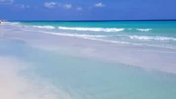 Beach nearby, sun loungers, beach towels