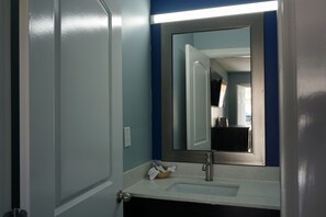 Signature Room, 1 King Bed, Smoking | Bathroom | Combined shower/tub, deep soaking tub, free toiletries, hair dryer