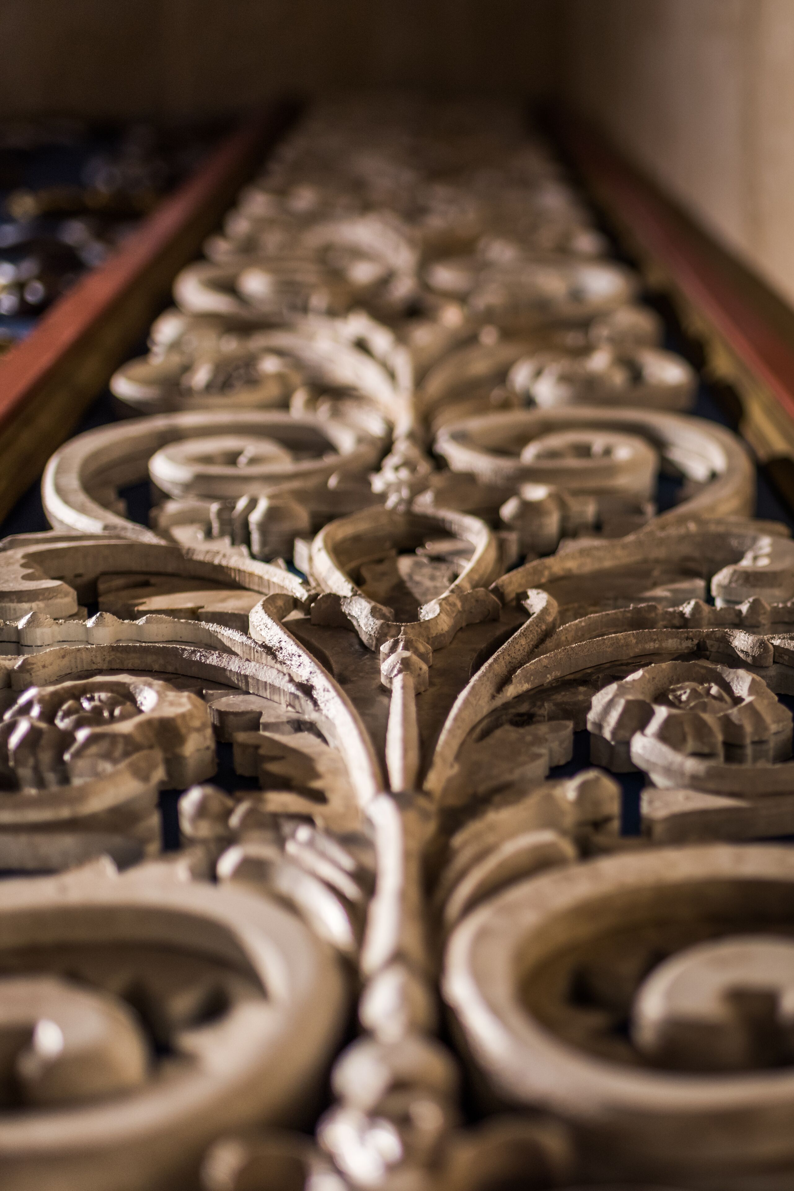 A close-up of ornate metalwork with intricate designs and patterns.
