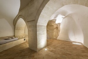 Family Suite, City View | Living area | Flat-screen TV - CasAmata (Matera)
