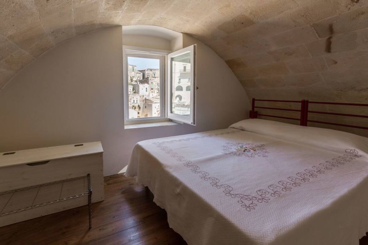 Suíte família, vista para a cidade | Roupas de cama premium, Wi-Fi de cortesia