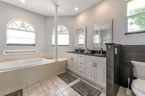 Combined shower/bathtub, hair dryer, towels, soap