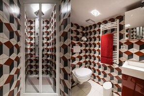 Shower, hair dryer, towels, toilet paper