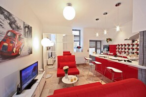 Televisión, reproductor de DVD y libros 