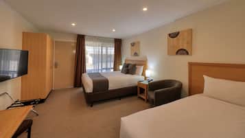 Deluxe Queen and Single | 2 bedrooms, blackout drapes, iron/ironing board, free WiFi