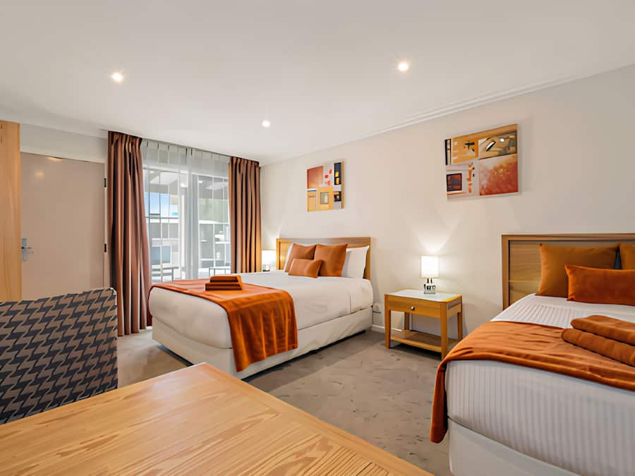 Deluxe Queen and Single | Blackout curtains, iron/ironing board, free WiFi, bed sheets