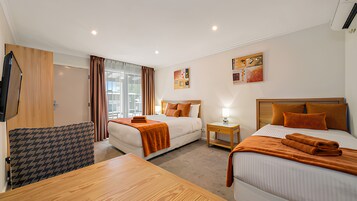 Deluxe Queen and Single | Blackout drapes, iron/ironing board, WiFi (free), bed sheets