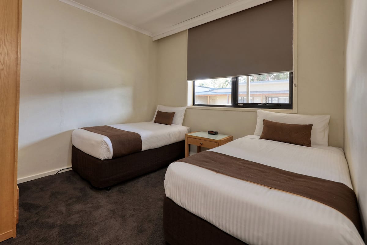 2 bedrooms, blackout curtains, iron/ironing board, free WiFi