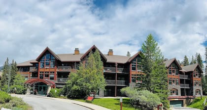 Condo spacieux niché sur un flanc de montagne