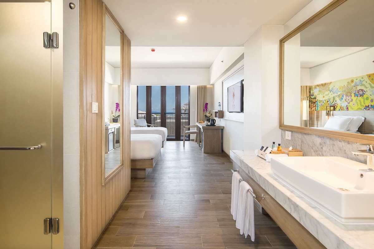 superior twin room | bathroom | shower, free toiletries, hair dryer, bathrobes