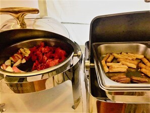 Daily buffet breakfast (USD 9 per person)