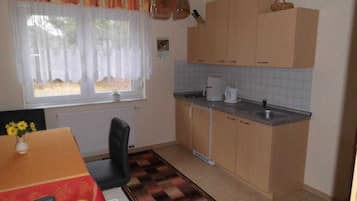 Fridge, coffee/tea maker, electric kettle, toaster