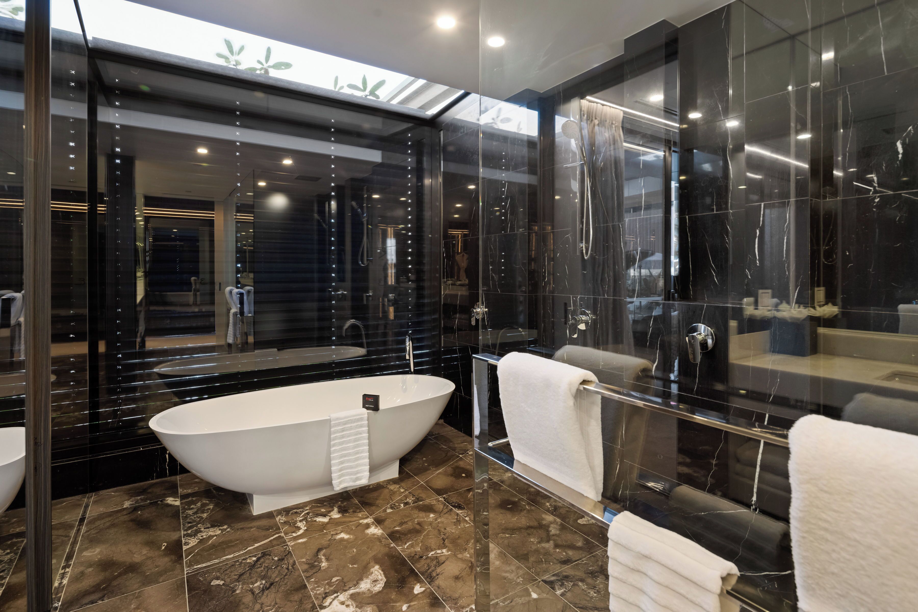 poolside cabana suite free wi-fi | bathroom | designer toiletries, hair dryer, bathrobes, slippers