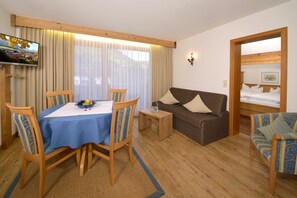 Apartment, 2 Bedrooms (Walmberg) | Living area | Flat-screen TV - Gästehaus Kaindl (Reit im Winkl)