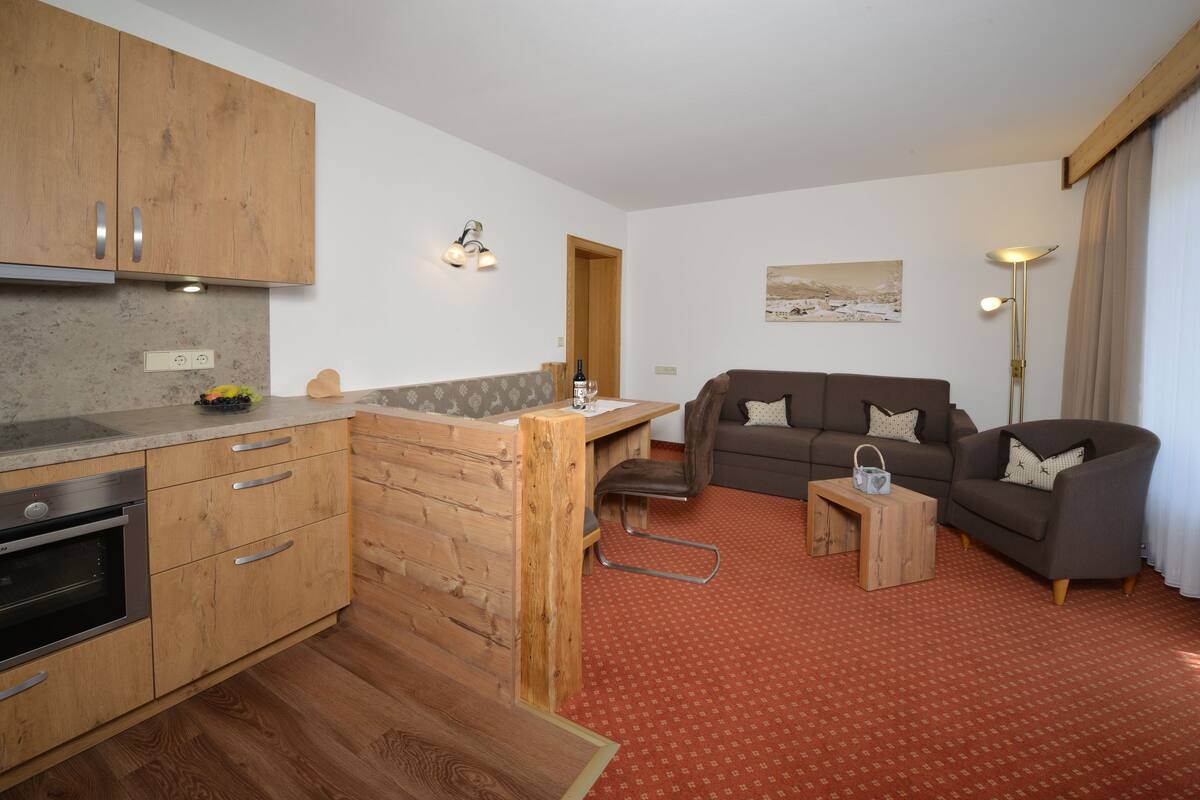 Apartamento, 2 quartos (Hausberg) | Área de estar | TV de tela plana