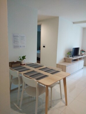 Deluxe One-Bedroom Condo | In-room dining