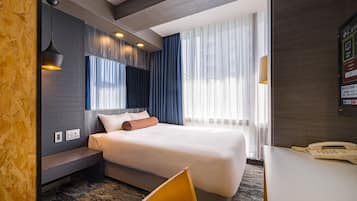 Desk, blackout drapes, iron/ironing board, free WiFi