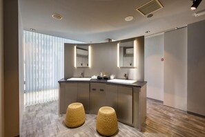 A modern bathroom with a large vanity, two sinks, and a mirror. - Hotel Oak Shizuoka (Shizuoka)