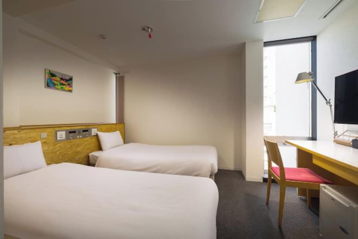 Desk, blackout curtains, iron/ironing board (on request), free WiFi