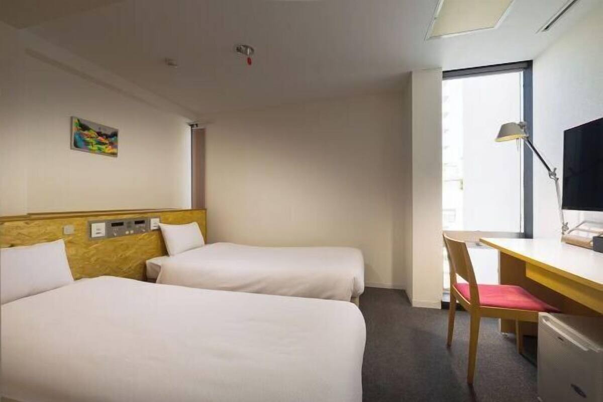 Desk, blackout curtains, iron/ironing board (on request), free WiFi