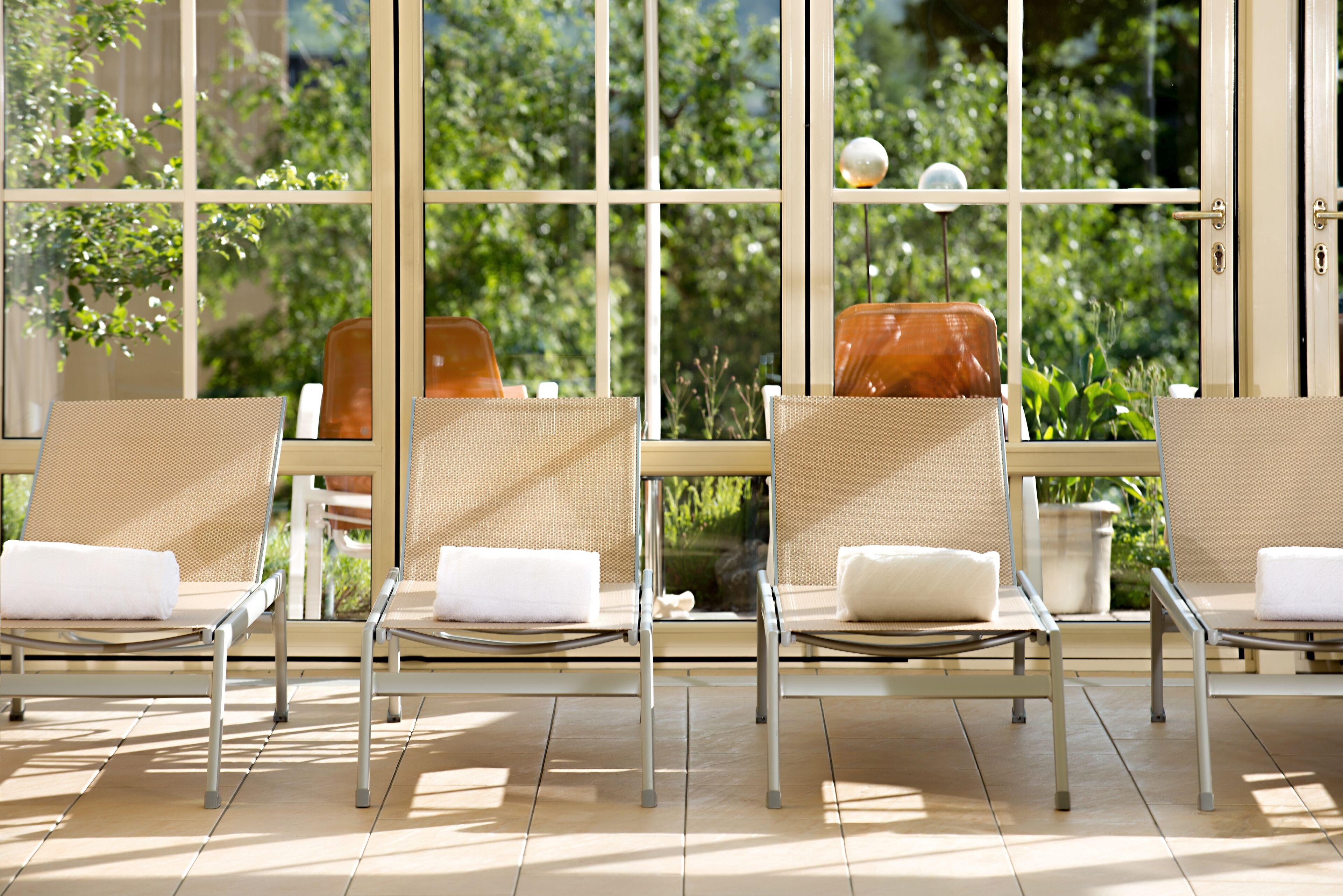 Indoor pool, open 7:00 AM to 9:00 PM, pool umbrellas, pool loungers