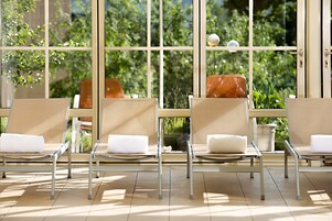 Indoor pool, open 7:00 AM to 9:00 PM, pool umbrellas, sun loungers