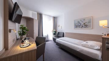 Standard-Einzelzimmer | Minibar, Schreibtisch, laptopgeeigneter Arbeitsplatz, kostenloses WLAN