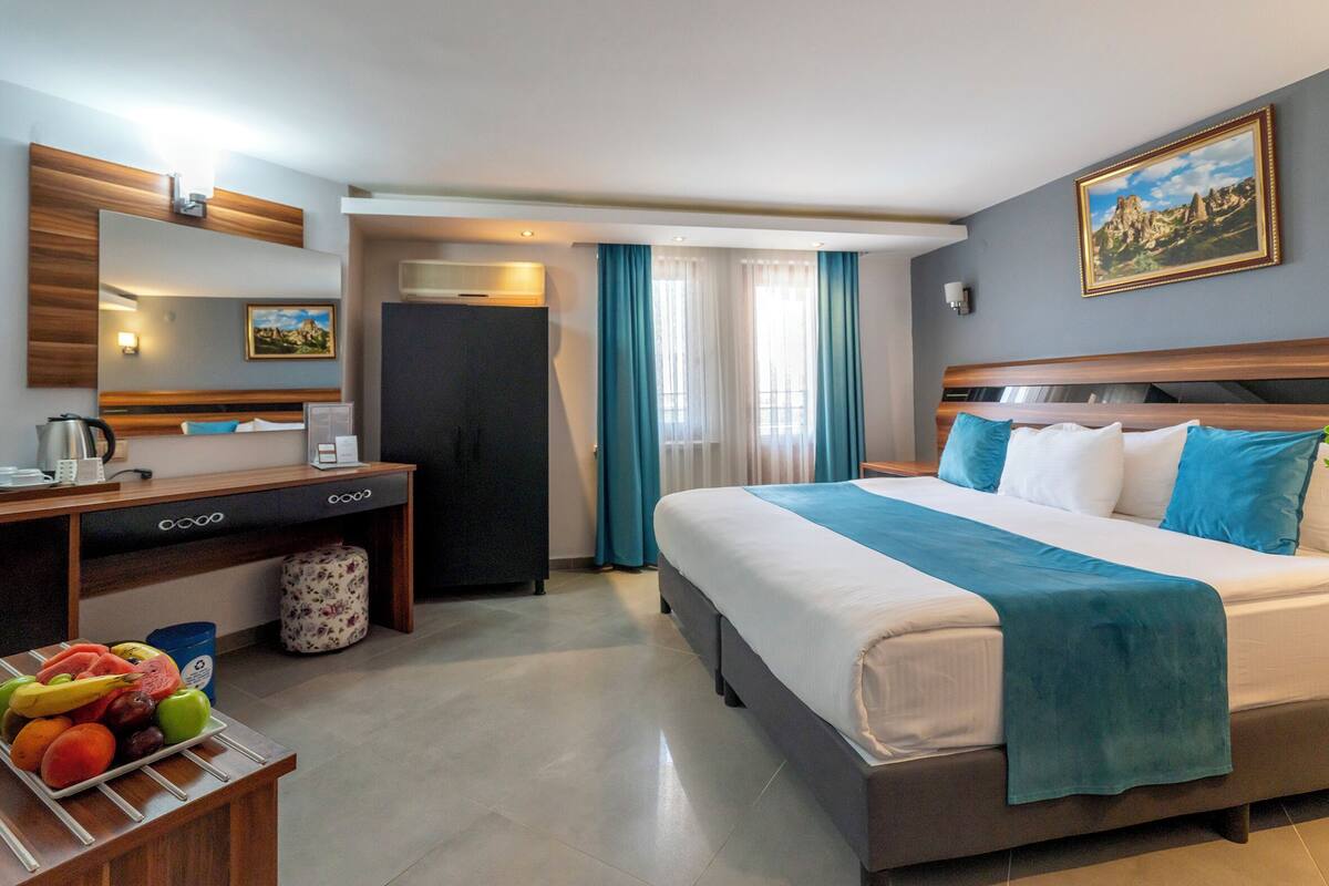 Suite ejecutiva, 1 habitación | Ropa de cama de alta calidad, minibar, caja fuerte y escritorio