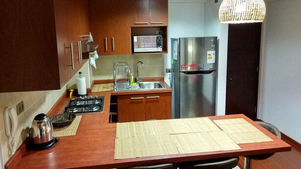 Private kitchen - Departamento Condominios Altos de Huayquique 001 (Iquique)
