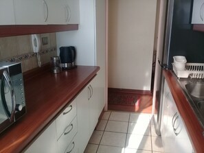 Full-sized fridge, microwave, coffee/tea maker