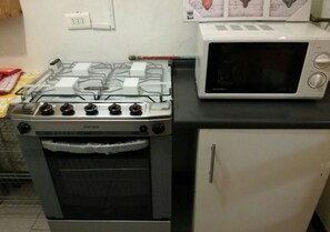 Full-sized fridge, microwave, coffee/tea maker, cookware/dishes/utensils