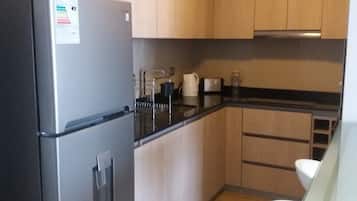 Microwave, coffee/tea maker, cookware/dishes/utensils